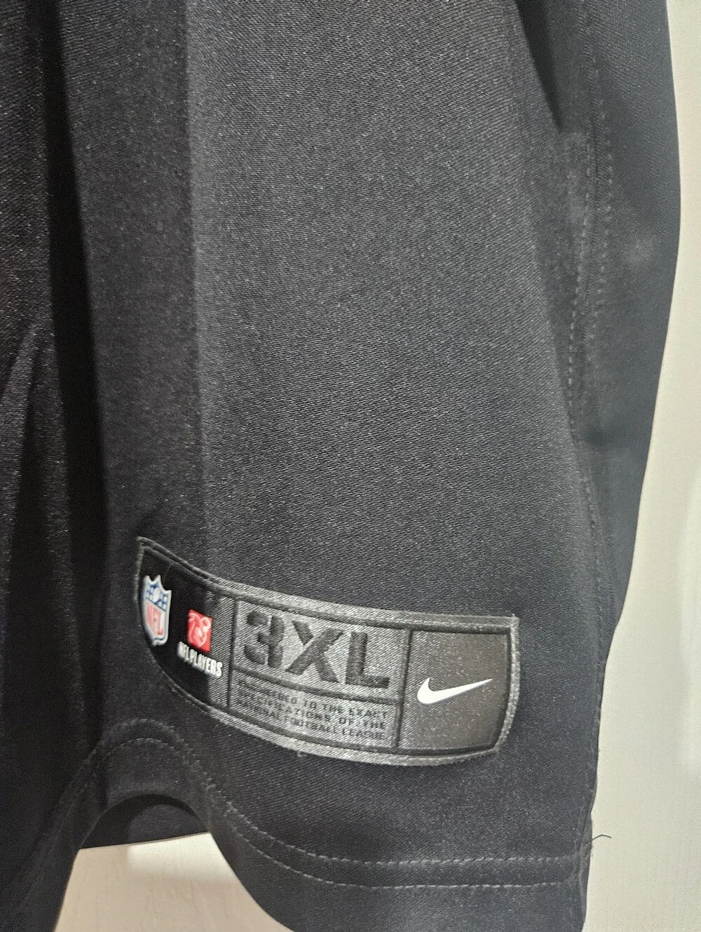 Nike Men’s Black Football Jersey with White 28 and Jacobs